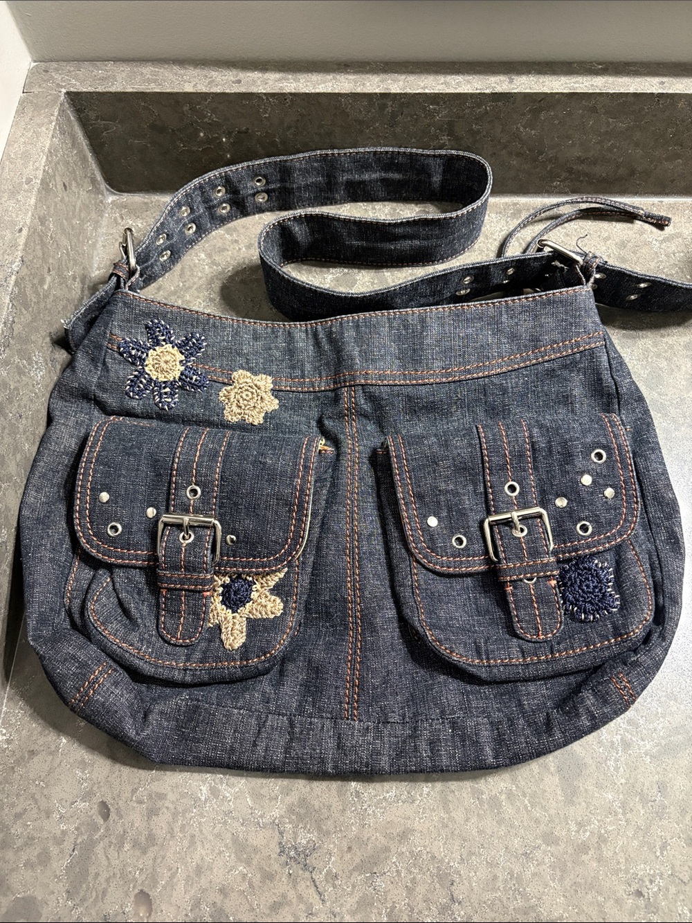 The Sak Denim Crossbody Bag with Navy & Cream Floral Embroidery